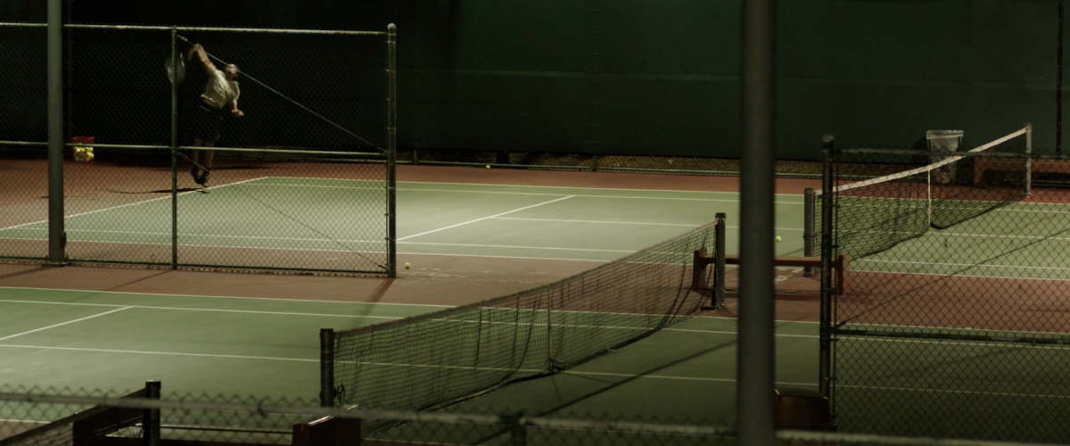 Jeremy Sisto serving in tennis in Break Point